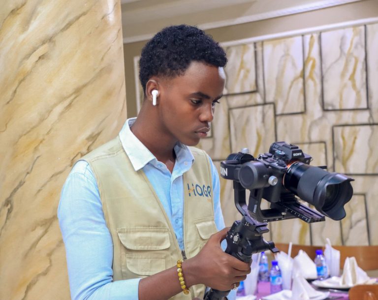 Hage Media cameraman indoor