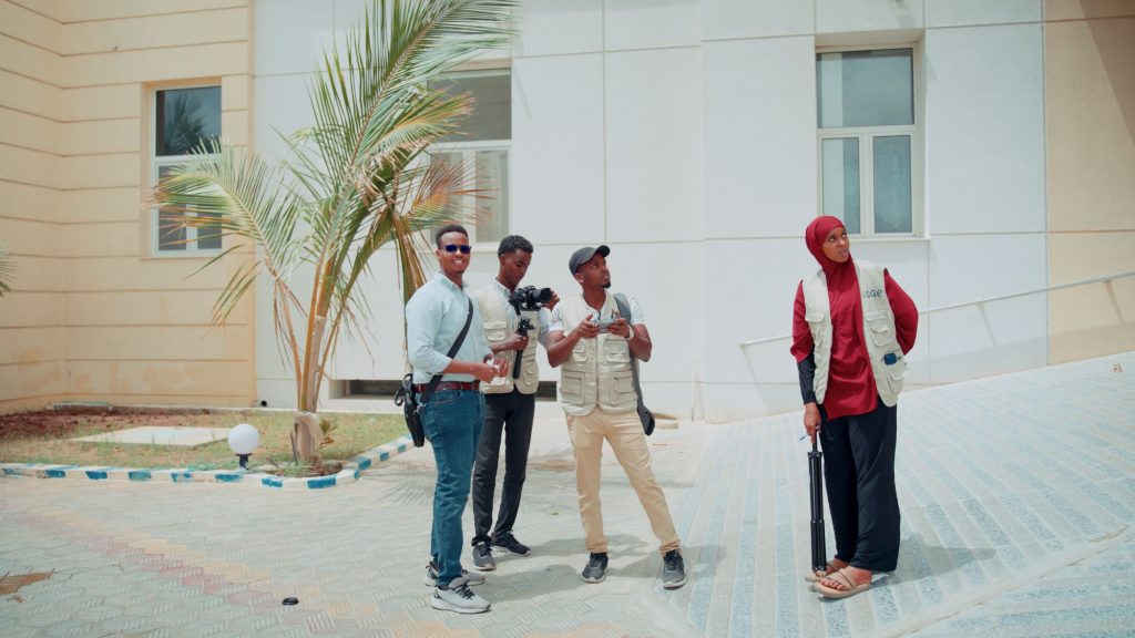 Hage Media crew hospital courtyard