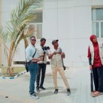 Hage Media crew hospital courtyard