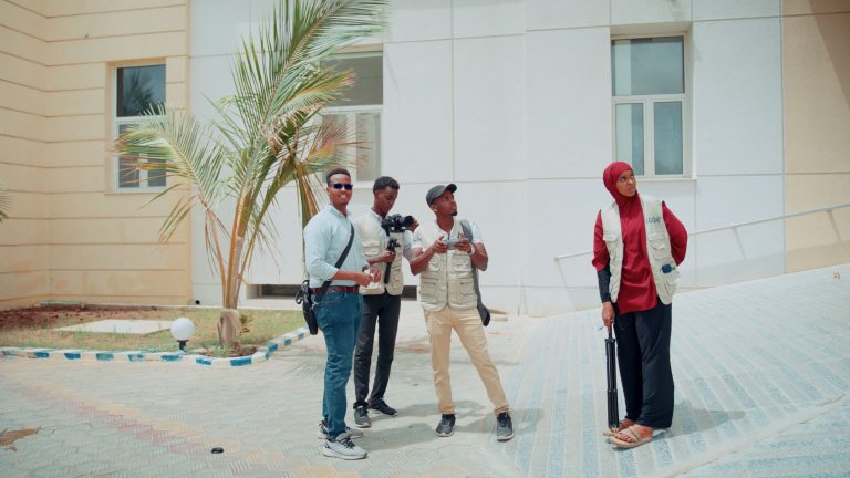 Hage Media crew hospital courtyard